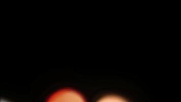 A black background with a red heart shape video