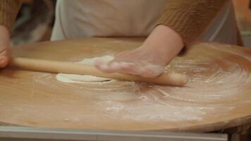 Kneading dough for traditional bread in a warm kitchen setting video