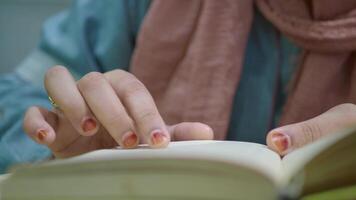 Exploring the joy of reading in a cozy indoor space video