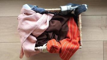 Organizing a basket of clothes using simple methods at home video