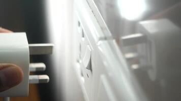 How to properly connect a charger to a wall socket video