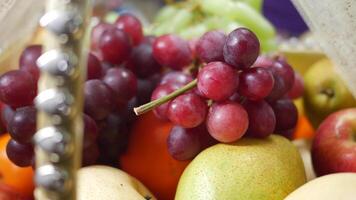 Fresh fruits displayed at a market in vibrant colors for selection video