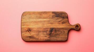 Beautiful Simple Wooden Cutting Board Perfect for Culinary Use on a Solid Coral Background for Kitchen Decor or Food Photography photo