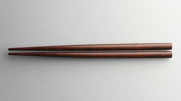 Display of Simple Wooden Chopsticks on a Solid Gray Background Ideal for Asian Cuisine and Culinary Promotions photo