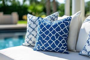 Comfortable Blue and White Pillows on a Modern Outdoor Sofa, Perfect for Relaxation and Design Inspiration photo