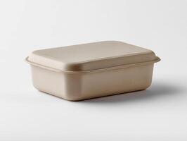 Biodegradable food container with lid on white background photo