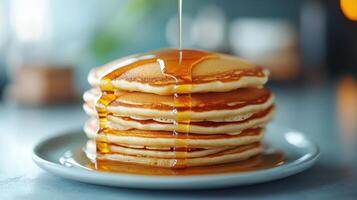 Delicious Stack of Fluffy Pancakes With Maple Syrup Dripping Down - Perfect for Breakfast or Brunch Enthusiasts photo