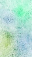 Blue green color particles vertical abstract background with shallow depth of field. video