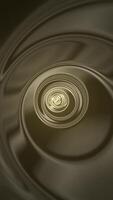 Stylish abstract background with a dynamic liquid motion gold effect. Glossy, metallic golden finish. Shiny hypnotic circle swirls. Full HD looping vertical animation. video