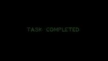 Task Completed text glitch animation on black background video