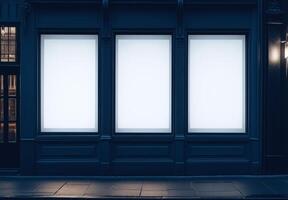 Three large windows on a building with a blue background photo