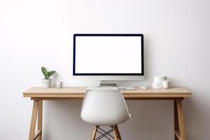 A computer desk with a white chair and a computer monitor isolated with white wall photo