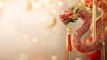 A red dragon is hanging from a string photo