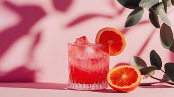 Refreshing Citrus Drink with Ice and Orange Slices photo