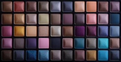 A close up of a makeup palette with many different colours photo