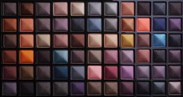 Close up of a makeup palette with many different colours photo