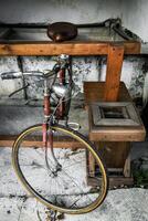Front View of Vintage 1970s Bicycle in Rustic Warehouse Scene photo