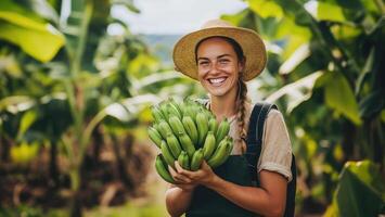 Smiling farmer holds fresh green bananas in lush banana plantation during sunny day photo
