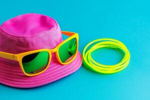 Colorful summer accessories on a vibrant background. photo