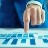 Businessman analyzing data on a touchscreen interface. photo
