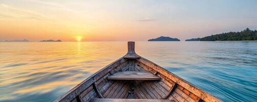 Serene boat view at sunset over calm waters and distant islands. photo