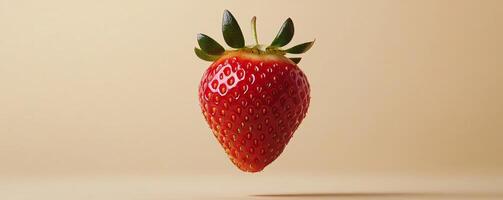 strawberry on a smooth beige background. photo