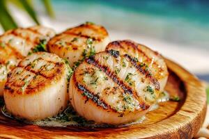 Grilled scallops served on a wooden platter outdoors. photo
