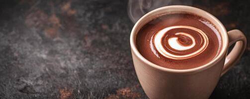 A steaming cup of coffee with a decorative swirl on top. photo