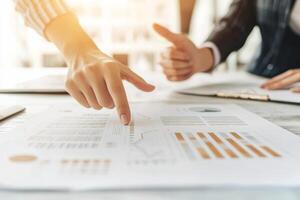 Collaboration on business analytics report with positive feedback. photo
