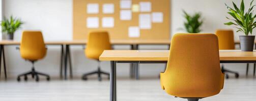 Modern office with yellow chairs and a clean workspace design. photo