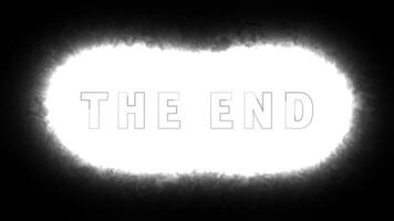 The End text with glowing white explosion on black background video
