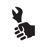 design of a hand holding a wrench vector