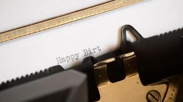 Typing the expression Happy Birthday with an old manual typewriter video