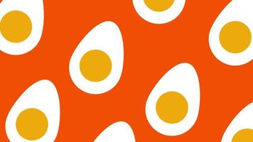 An orange and white background with repeated egg icons offers a bold and modern food pattern layout video