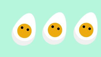 Tres sonriente huevos línea arriba con simpático caras en un menta fondo, radiante alegría y juguetón sencillez video