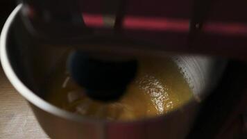 Electric mixer whisking eggs and sugar for baking video