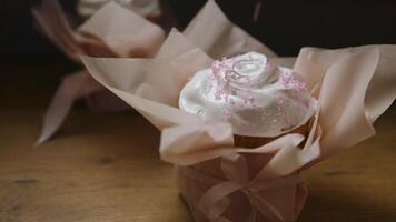 Easter cupcake with icing and red sugar sprinkles video