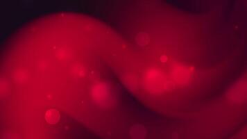 Red swirling abstract background with soft glowing lights ideal for festive designs holiday projects modern artwork or dynamic backgrounds video