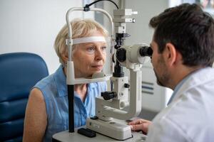 Detailed medical eye examination in a clinical setting with a patient and doctor photo