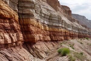 Exploring the colorful stratigraphic discordancy in a rugged landscape revealing Earth's geological history photo