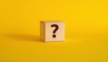Quest Icon on Wooden Cube with Yellow Background photo