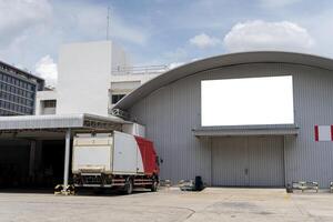 Cargo delivery truck at a modern warehouse enhancing logistics and distribution efficiency photo