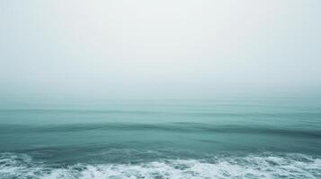Foggy, misty day at the beach photo