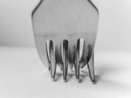 Close up of fork with the letters A and D on it photo
