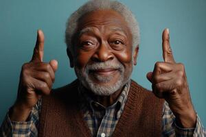 An older black man with a beard and vest making the sign for yes photo