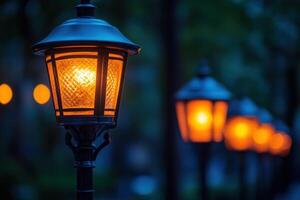 A row of street lamps with lights on them photo