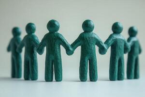 A group of people holding hands in a circle photo
