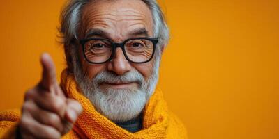 An old man with glasses and a scarf pointing at something photo