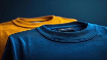 Brightly colored t-shirts displayed together on a dark background showcasing texture and fabric quality photo