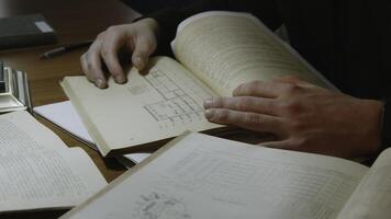 Exploring historical documents and technical diagrams for deeper understanding and insights. Media photo